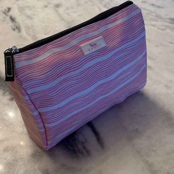 SCOUT Packin' Heat Makeup Bag featuring a pink and white wavy stripe pattern. - Picture 3 of 15